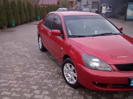 Червоний Міцубісі Lancer, об'ємом двигуна 1.6 л та пробігом 191 тис. км за 4900 $, фото 1 на Automoto.ua