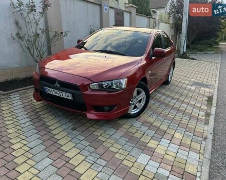 Червоний Міцубісі Lancer, об'ємом двигуна 2 л та пробігом 127 тис. км за 6400 $, фото 1 на Automoto.ua