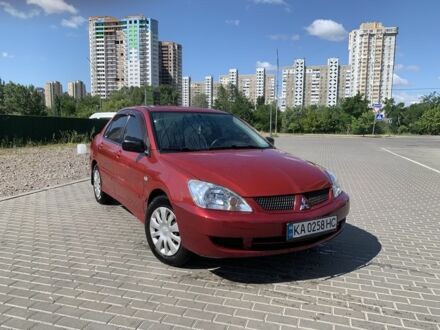 Міцубісі Lancer 2008 у Києві на Automoto.ua Червоний Міцубісі Lancer, об'ємом двигуна 1.6 л та пробігом 299 тис. км за 4400 $, фото 1 на Automoto.ua