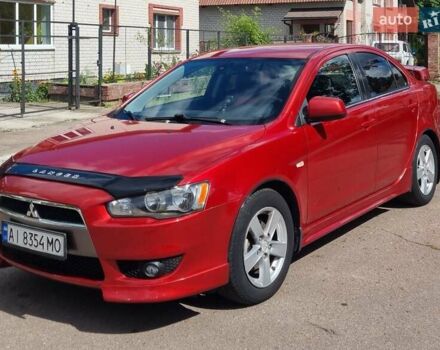 Червоний Міцубісі Lancer, об'ємом двигуна 2 л та пробігом 270 тис. км за 6600 $, фото 1 на Automoto.ua