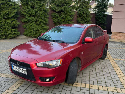 Червоний Міцубісі Lancer, об'ємом двигуна 2 л та пробігом 143 тис. км за 5200 $, фото 1 на Automoto.ua
