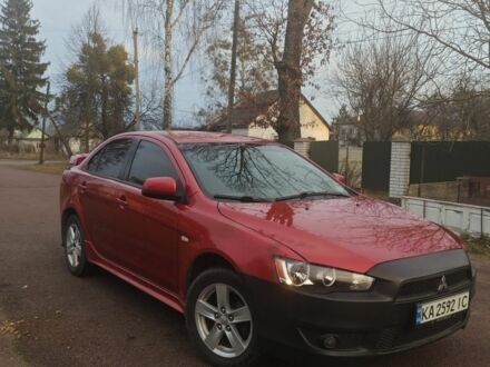 Червоний Міцубісі Lancer, об'ємом двигуна 2 л та пробігом 300 тис. км за 3950 $, фото 1 на Automoto.ua