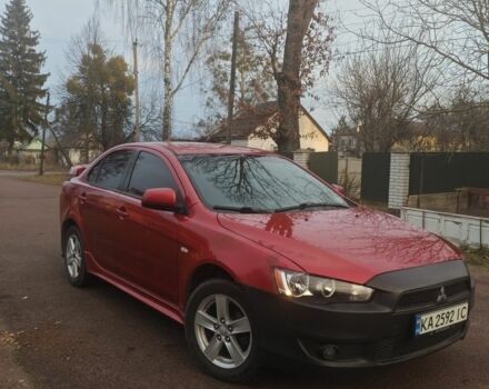 Красный Мицубиси Лансер, объемом двигателя 2 л и пробегом 300 тыс. км за 3950 $, фото 1 на Automoto.ua