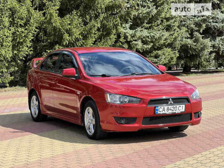 Червоний Міцубісі Lancer, об'ємом двигуна 2 л та пробігом 250 тис. км за 7200 $, фото 1 на Automoto.ua