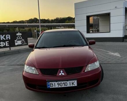 Червоний Міцубісі Lancer, об'ємом двигуна 1.6 л та пробігом 257 тис. км за 4600 $, фото 1 на Automoto.ua