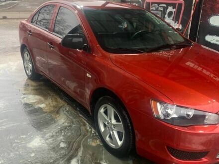 Красный Мицубиси Лансер, объемом двигателя 1.8 л и пробегом 205 тыс. км за 5800 $, фото 1 на Automoto.ua