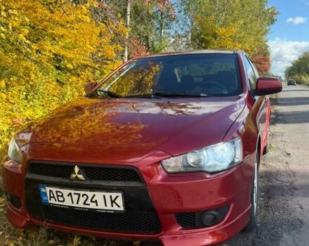 Червоний Міцубісі Lancer, об'ємом двигуна 2 л та пробігом 209 тис. км за 6500 $, фото 1 на Automoto.ua