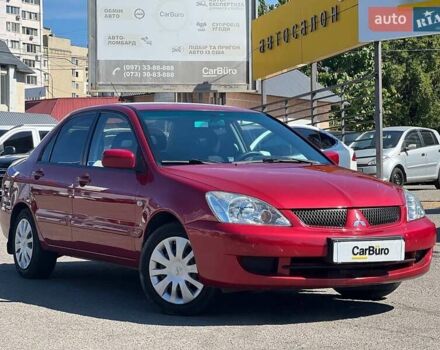Червоний Міцубісі Lancer, об'ємом двигуна 1.6 л та пробігом 223 тис. км за 6500 $, фото 1 на Automoto.ua