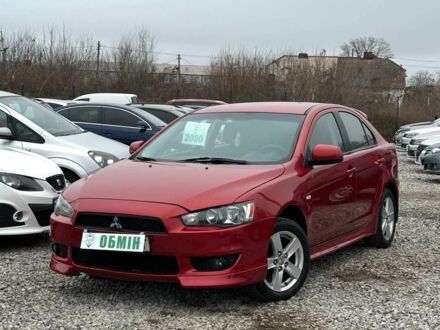 Красный Мицубиси Лансер, объемом двигателя 1.8 л и пробегом 195 тыс. км за 6900 $, фото 1 на Automoto.ua