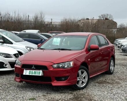 Червоний Міцубісі Lancer, об'ємом двигуна 1.8 л та пробігом 195 тис. км за 6900 $, фото 1 на Automoto.ua