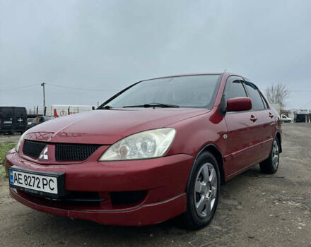 Червоний Міцубісі Lancer, об'ємом двигуна 1.6 л та пробігом 224 тис. км за 4300 $, фото 1 на Automoto.ua