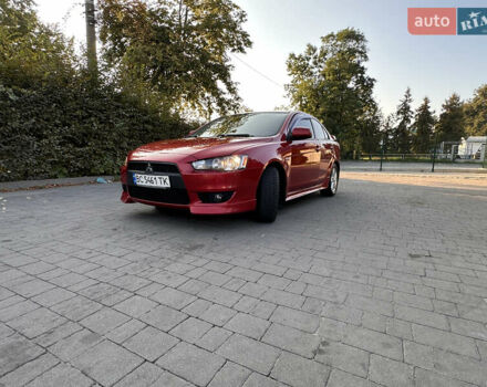 Червоний Міцубісі Lancer, об'ємом двигуна 2 л та пробігом 282 тис. км за 6300 $, фото 1 на Automoto.ua