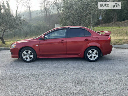 Червоний Міцубісі Lancer, об'ємом двигуна 2 л та пробігом 149 тис. км за 8500 $, фото 1 на Automoto.ua