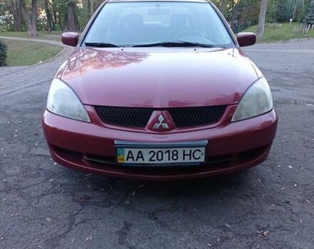 Червоний Міцубісі Lancer, об'ємом двигуна 1.6 л та пробігом 176 тис. км за 3900 $, фото 1 на Automoto.ua