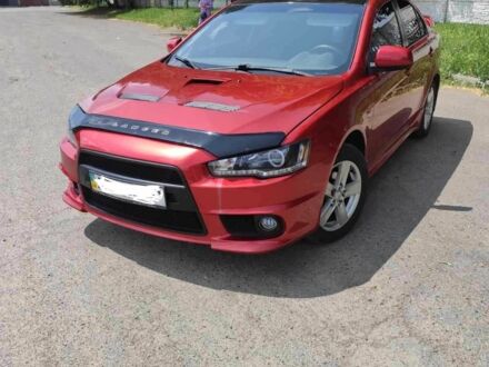 Міцубісі Lancer 2008 у Соленом на Automoto.ua Червоний Міцубісі Lancer, об'ємом двигуна 2 л та пробігом 300 тис. км за 6500 $, фото 1 на Automoto.ua