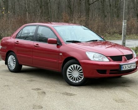 Червоний Міцубісі Lancer, об'ємом двигуна 1.6 л та пробігом 220 тис. км за 4600 $, фото 1 на Automoto.ua