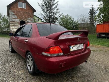 Червоний Міцубісі Lancer, об'ємом двигуна 1.6 л та пробігом 275 тис. км за 3750 $, фото 1 на Automoto.ua