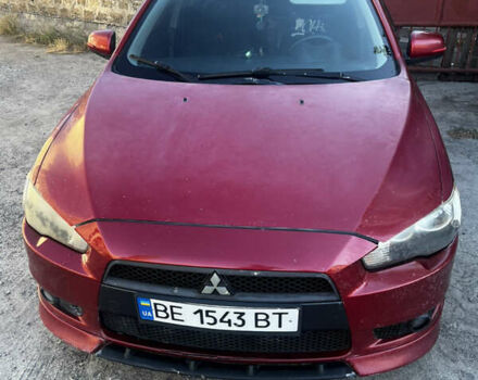 Червоний Міцубісі Lancer, об'ємом двигуна 2 л та пробігом 242 тис. км за 6500 $, фото 1 на Automoto.ua
