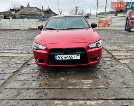 Красный Мицубиси Лансер, объемом двигателя 2 л и пробегом 299 тыс. км за 6500 $, фото 1 на Automoto.ua