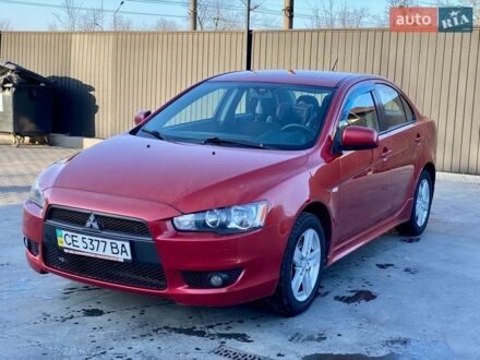 Красный Мицубиси Лансер, объемом двигателя 2 л и пробегом 170 тыс. км за 5200 $, фото 1 на Automoto.ua