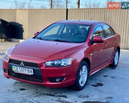 Красный Мицубиси Лансер, объемом двигателя 2 л и пробегом 170 тыс. км за 5200 $, фото 1 на Automoto.ua