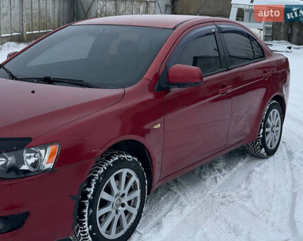 Красный Мицубиси Лансер, объемом двигателя 1.5 л и пробегом 277 тыс. км за 4299 $, фото 1 на Automoto.ua