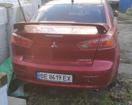 Красный Мицубиси Лансер, объемом двигателя 2 л и пробегом 170 тыс. км за 1600 $, фото 1 на Automoto.ua