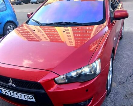 Красный Мицубиси Лансер, объемом двигателя 2 л и пробегом 259 тыс. км за 7800 $, фото 1 на Automoto.ua