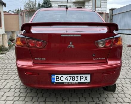 Красный Мицубиси Лансер, объемом двигателя 1.5 л и пробегом 290 тыс. км за 4500 $, фото 1 на Automoto.ua