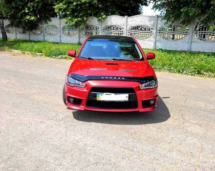 Червоний Міцубісі Lancer, об'ємом двигуна 2 л та пробігом 300 тис. км за 6200 $, фото 1 на Automoto.ua