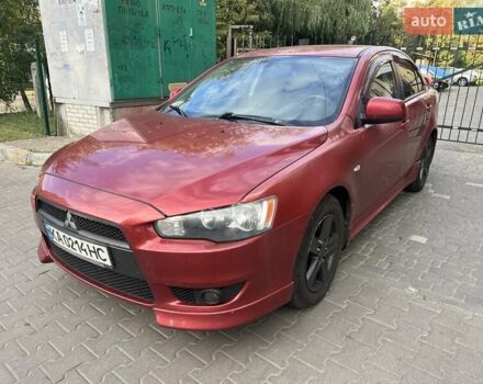 Червоний Міцубісі Lancer, об'ємом двигуна 2 л та пробігом 189 тис. км за 5200 $, фото 1 на Automoto.ua