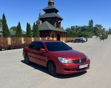 Червоний Міцубісі Lancer, об'ємом двигуна 1.6 л та пробігом 274 тис. км за 5500 $, фото 1 на Automoto.ua