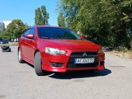 Червоний Міцубісі Lancer, об'ємом двигуна 2 л та пробігом 139 тис. км за 7000 $, фото 1 на Automoto.ua