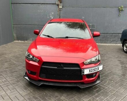Червоний Міцубісі Lancer, об'ємом двигуна 2 л та пробігом 137 тис. км за 8500 $, фото 1 на Automoto.ua