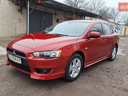 Красный Мицубиси Лансер, объемом двигателя 2 л и пробегом 120 тыс. км за 7800 $, фото 1 на Automoto.ua