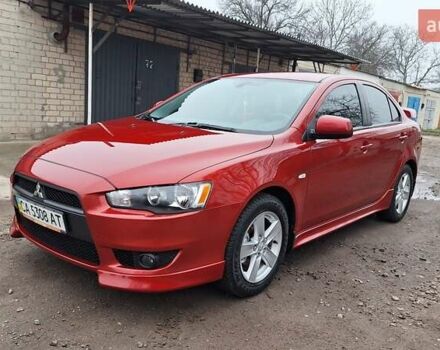 Червоний Міцубісі Lancer, об'ємом двигуна 2 л та пробігом 120 тис. км за 7800 $, фото 1 на Automoto.ua