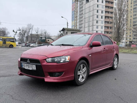 Красный Мицубиси Лансер, объемом двигателя 2 л и пробегом 170 тыс. км за 6300 $, фото 1 на Automoto.ua