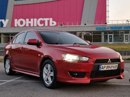 Червоний Міцубісі Lancer, об'ємом двигуна 1.8 л та пробігом 150 тис. км за 8200 $, фото 1 на Automoto.ua