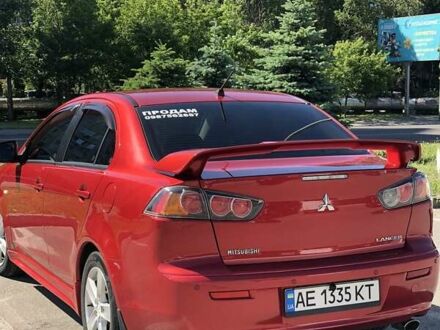 Червоний Міцубісі Lancer, об'ємом двигуна 2 л та пробігом 207 тис. км за 7500 $, фото 1 на Automoto.ua