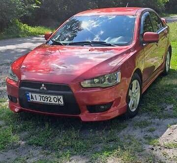 Міцубісі Lancer 2009 у Рокитном на Automoto.ua Червоний Міцубісі Lancer, об'ємом двигуна 2 л та пробігом 197 тис. км за 7300 $, фото 1 на Automoto.ua