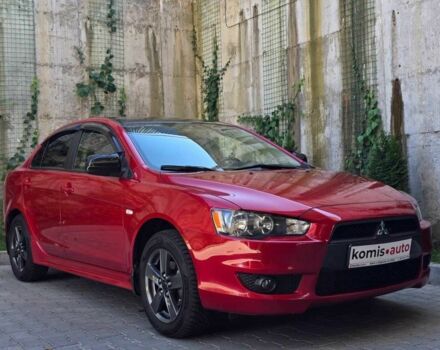 Червоний Міцубісі Lancer, об'ємом двигуна 2 л та пробігом 100 тис. км за 6999 $, фото 1 на Automoto.ua
