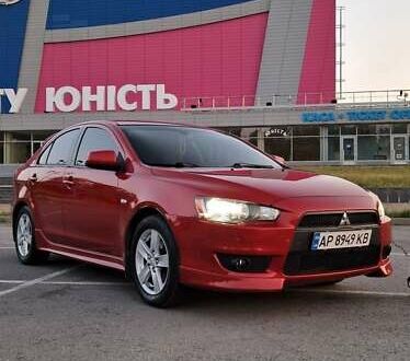 Червоний Міцубісі Lancer, об'ємом двигуна 1.8 л та пробігом 150 тис. км за 8200 $, фото 1 на Automoto.ua