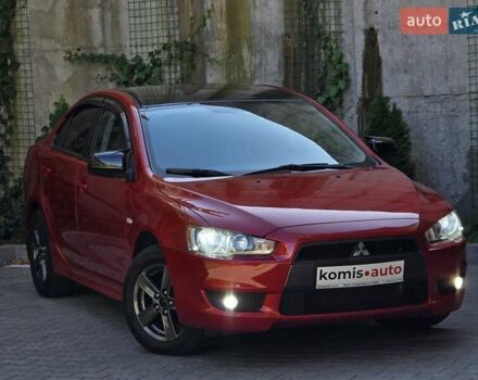 Червоний Міцубісі Lancer, об'ємом двигуна 2 л та пробігом 100 тис. км за 6999 $, фото 1 на Automoto.ua