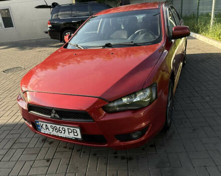 Червоний Міцубісі Lancer, об'ємом двигуна 2 л та пробігом 213 тис. км за 6299 $, фото 1 на Automoto.ua