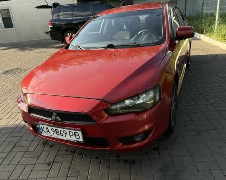 Червоний Міцубісі Lancer, об'ємом двигуна 2 л та пробігом 213 тис. км за 6400 $, фото 1 на Automoto.ua