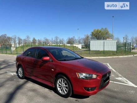 Червоний Міцубісі Lancer, об'ємом двигуна 2 л та пробігом 132 тис. км за 8950 $, фото 1 на Automoto.ua