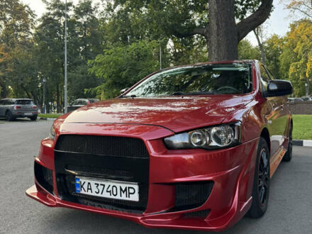 Мицубиси Лансер 2012 в Харькове на Automoto.ua Красный Мицубиси Лансер, объемом двигателя 2 л и пробегом 260 тыс. км за 7100 $, фото 1 на Automoto.ua