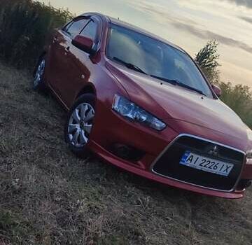 Червоний Міцубісі Lancer, об'ємом двигуна 1.59 л та пробігом 196 тис. км за 8000 $, фото 1 на Automoto.ua