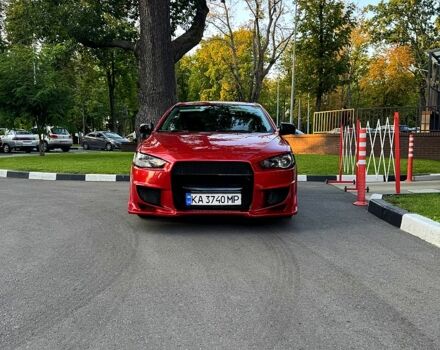 Червоний Міцубісі Lancer, об'ємом двигуна 2 л та пробігом 260 тис. км за 6900 $, фото 1 на Automoto.ua