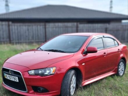 Червоний Міцубісі Lancer, об'ємом двигуна 0 л та пробігом 97 тис. км за 9000 $, фото 1 на Automoto.ua